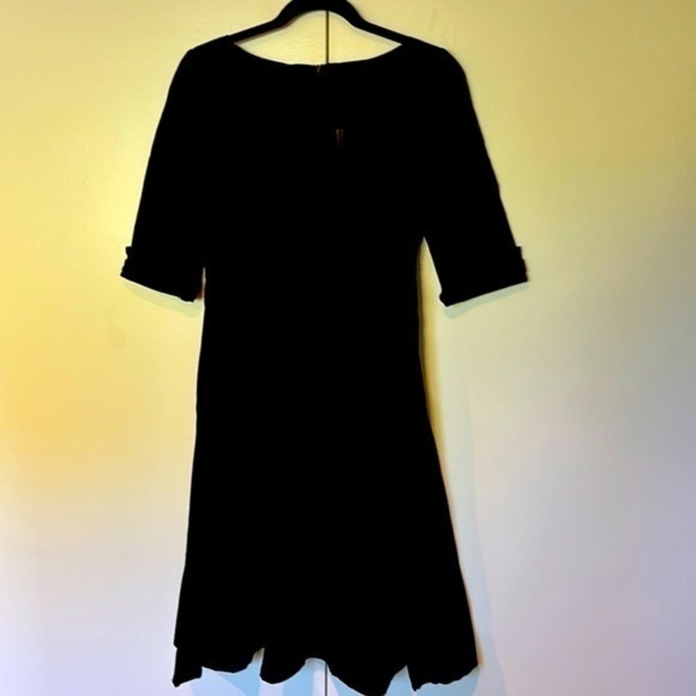 Black, mid-length dress with 3/4 sleeves